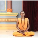 Sheetali pranayama while sitting in ardha padmasana